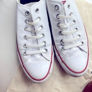 White converse with slip on laces.